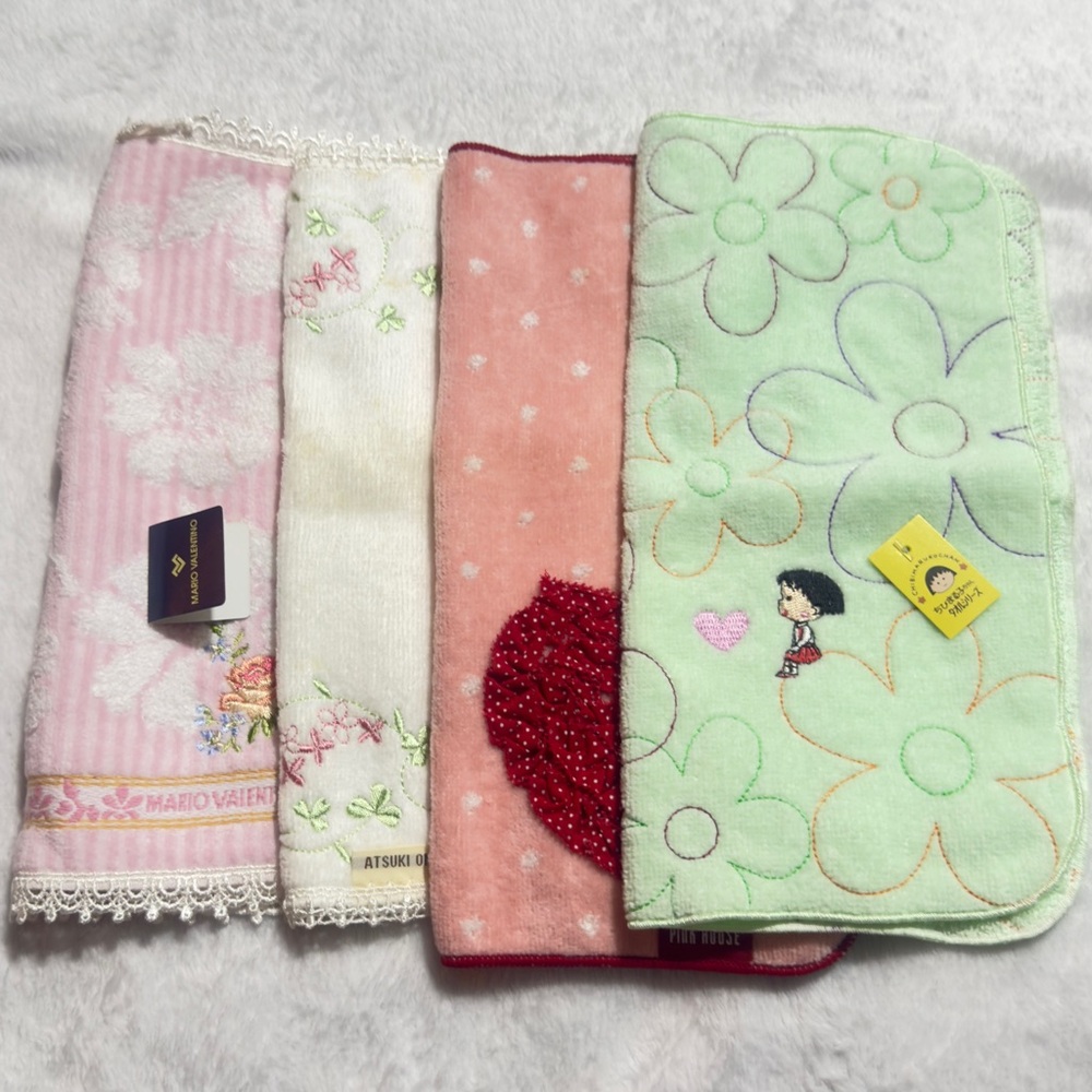 Mario Valentino Pink and White Face Towels